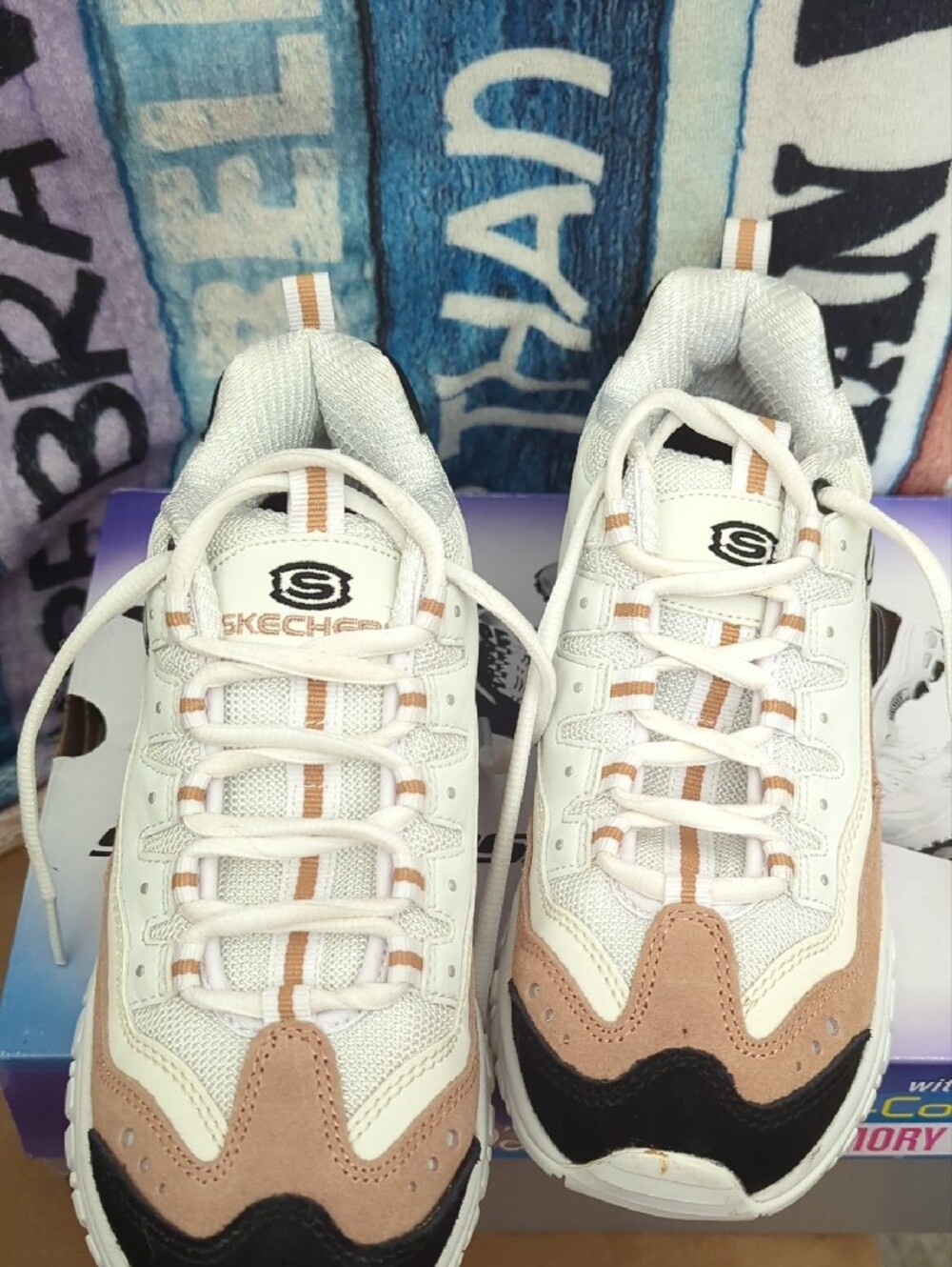 Skechers Women's White and Tan Sneakers with Black Heel Detail